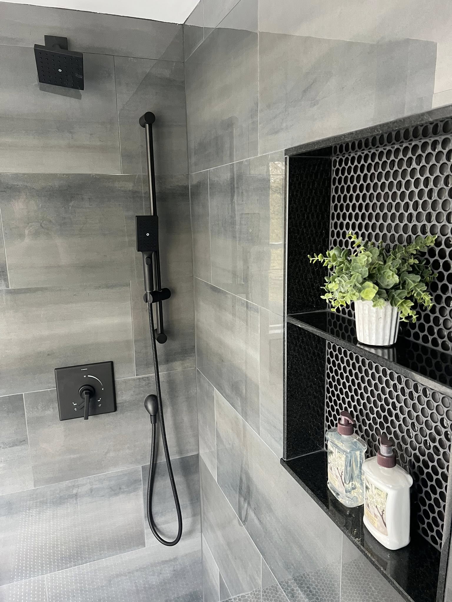 Completed modern shower plumbing installation by JPG Plumbing & Heating